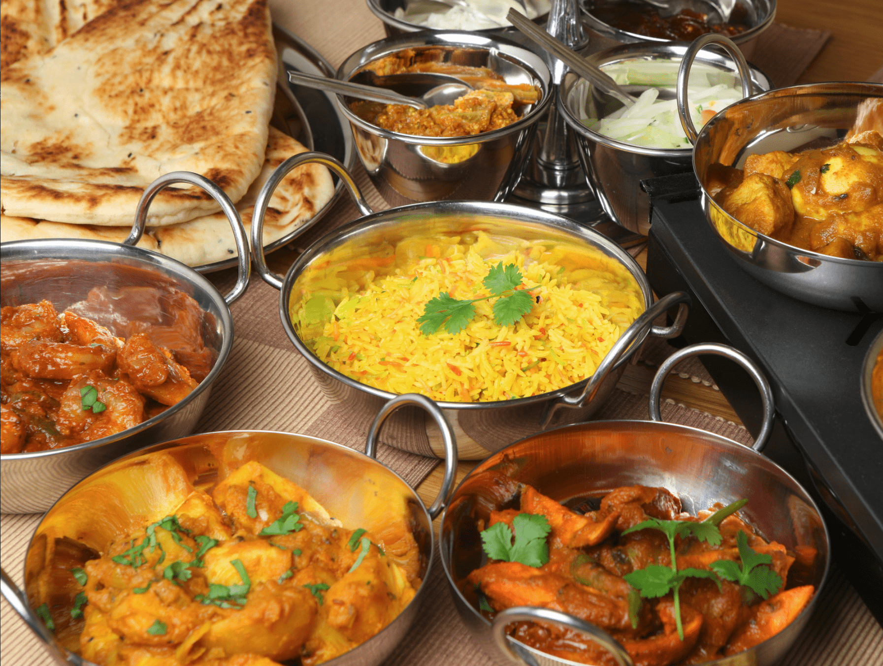 Family enjoying Indian dinner at Kentucky Curry House